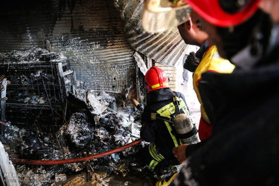  آتش سوزی پاساژ رضوان در احواز 9 زخمی برجای گذاشت + تصاویر