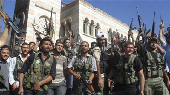 گروهی از انقلابیون  ارتش آزاد سوریه در روز پنجشنبه گذشته -عکس از رویترز