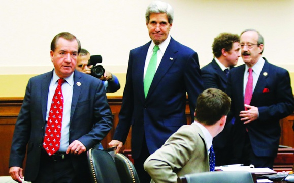 U.S. Secretary of State John Kerry (C) arrives with Committee Chairman U.S. Representative Ed Royce (R-CA) (L) and ranking member Representative Eliot Engel .