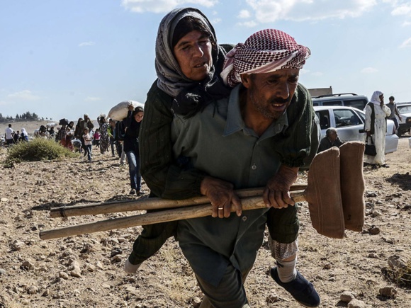 فرار دسته جمعي بیش از 200 هزار نفر از مردم سوریه از دست داعش+عكس فرار دسته جمعي بیش از 200 هزار نفر از مردم سوریه از دست داعش+عكس