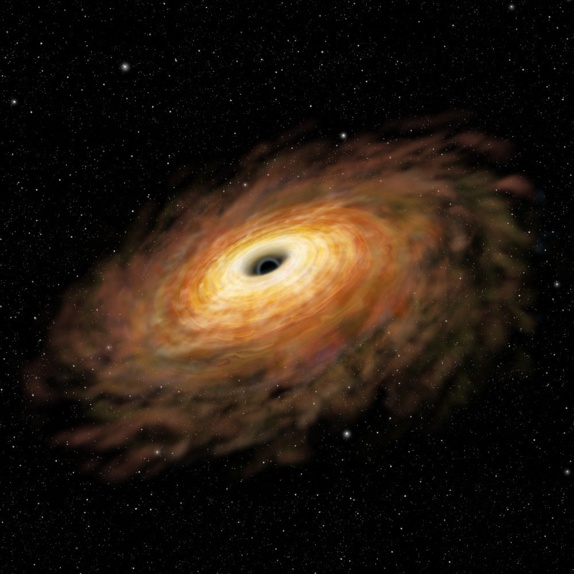 تکه پاره شدن یک کهکشان درخشان توسط سیاهچاله ای عظیم