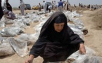 کشف 100جسد در قبرهای دسته جمعی توسط  گروه تروریستی داعش درموصل